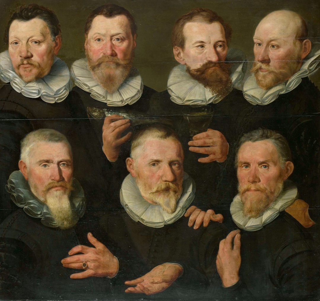 Portret van een Nederlandse archiefonderzoeker met grijze baard